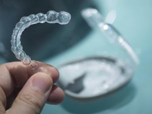 Milton Orthodontics Invisalign Retainers with a Case